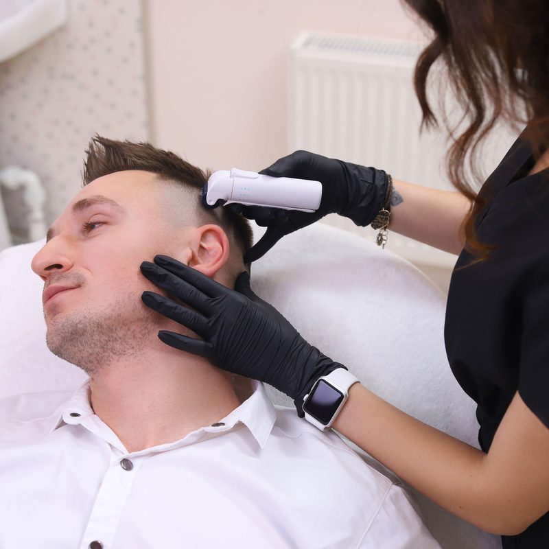 Man getting micro-needling treatment.