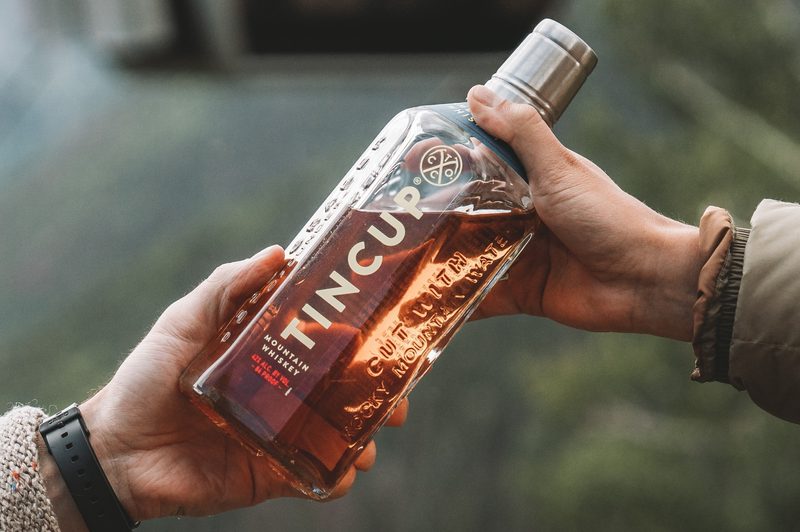 A bottle of TINCUP whiskey.