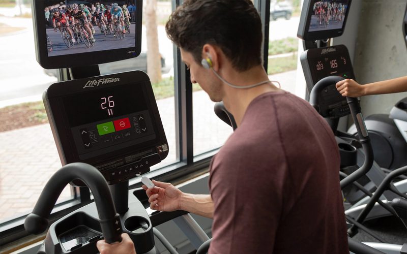 A person using the AirFly on a treadmill.