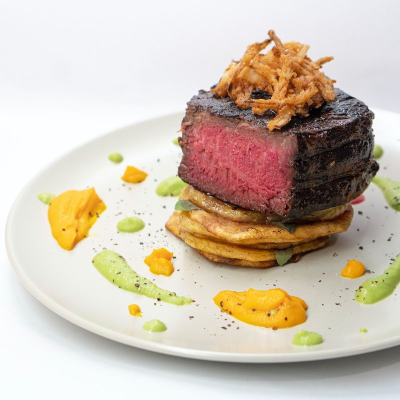 Plated filet mignon dish