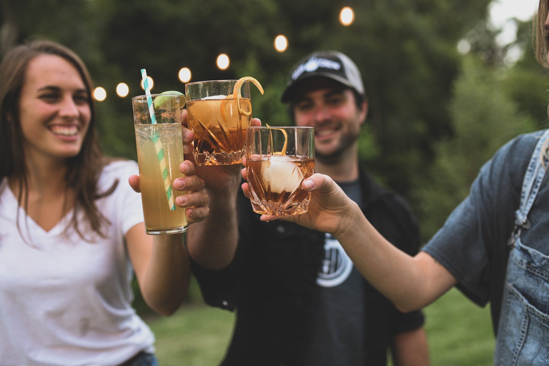 Friends toasting with drinks.