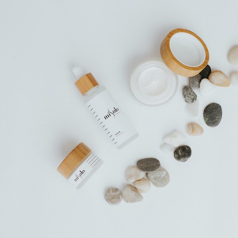 A flatlay of skincare products on white background