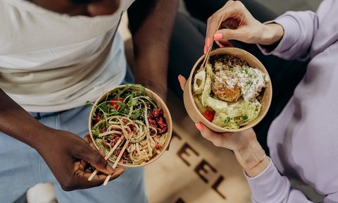 Man and woman eating healthy
