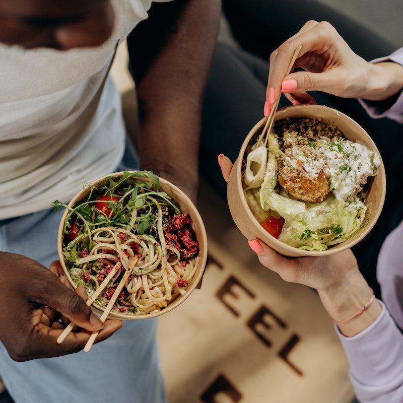 Man and woman eating healthy