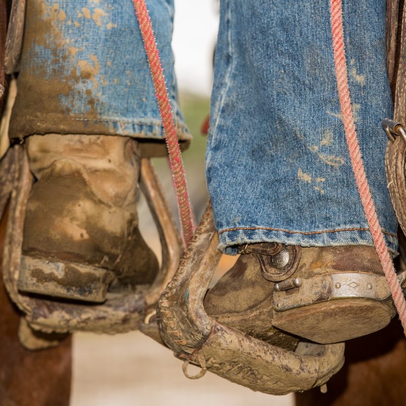 Cowboy boots in stir-ups