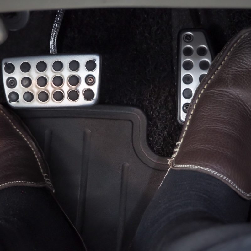 Driving shoe pressing the gas