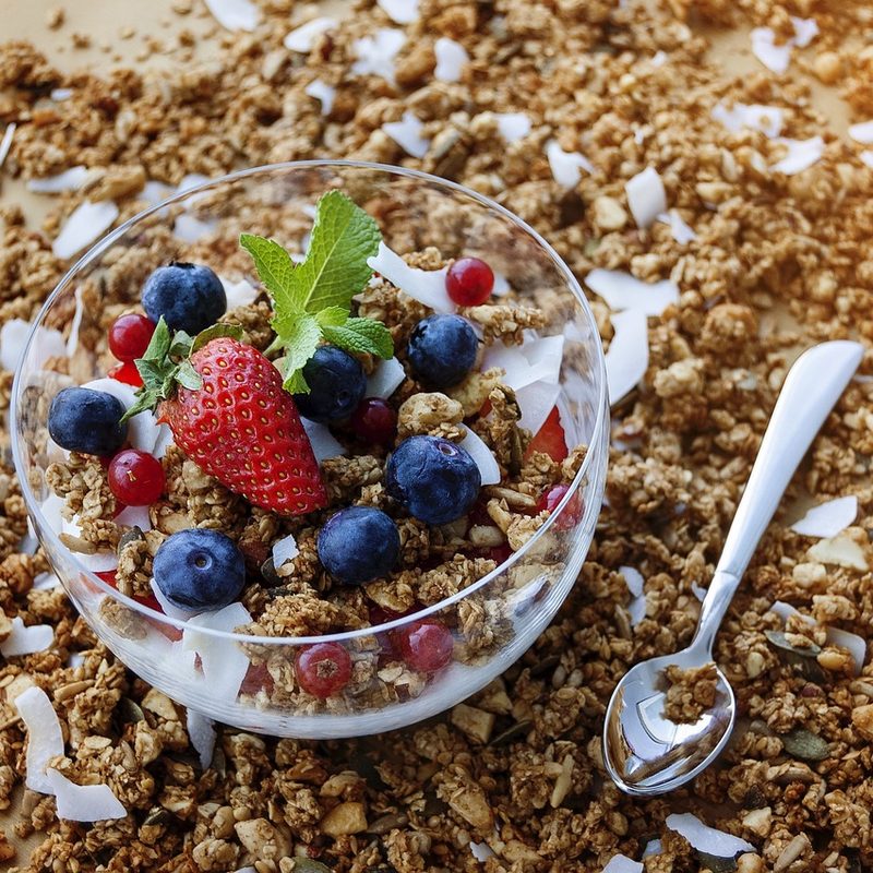A bowl of granola and fruit