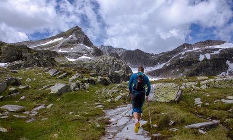 Man walking with hiking poles