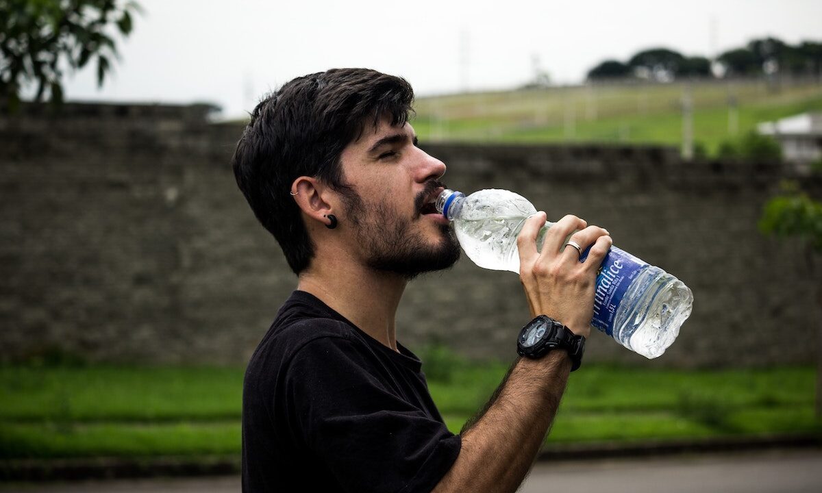a man drinking water
