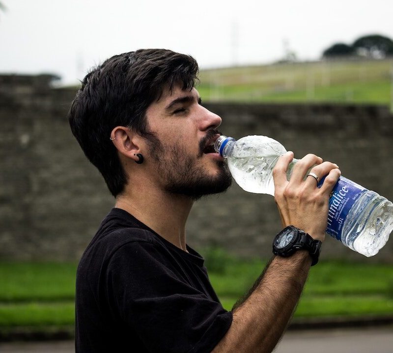 A man drinking water