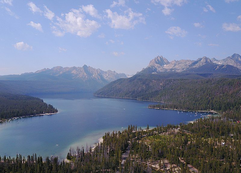 Drone shot of Idaho's Redfish Lake with the Sawtooth Mountains in the background.