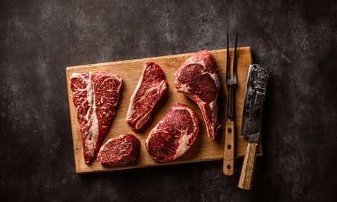 Cutting board with steaks
