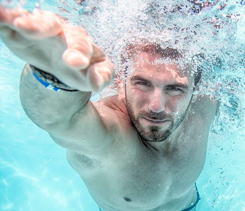 Man swimming hand