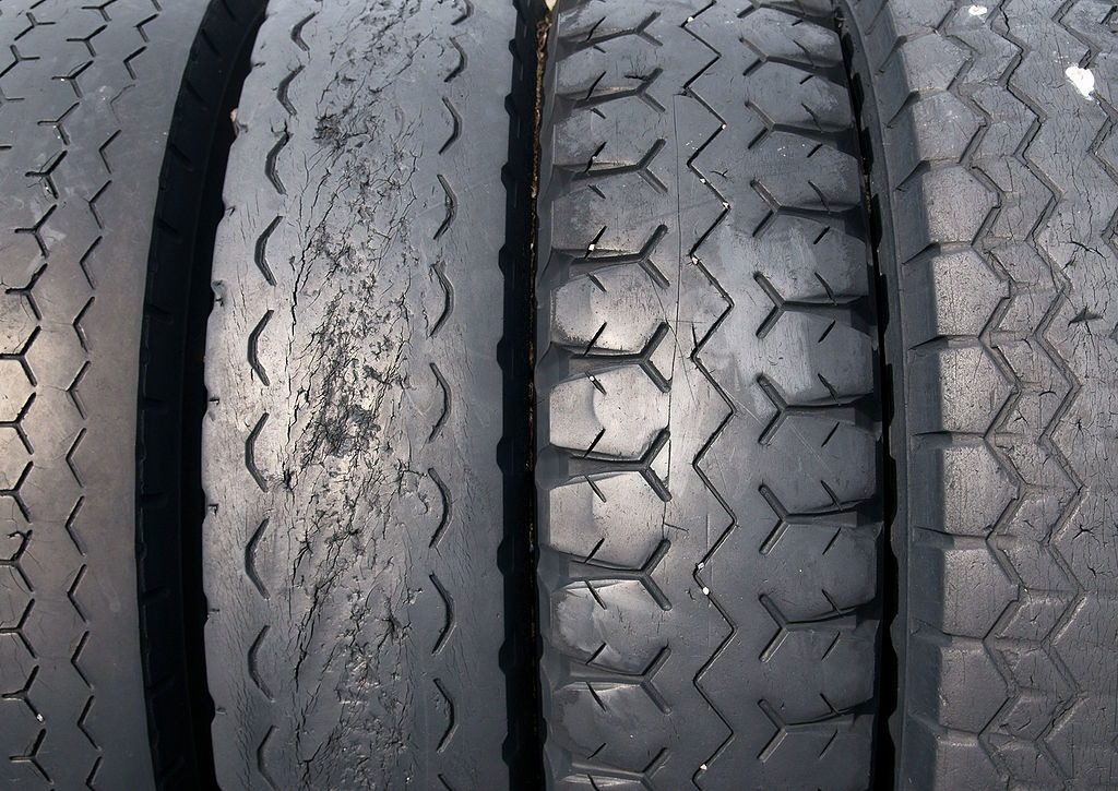 Side by side tires that have worn tread.