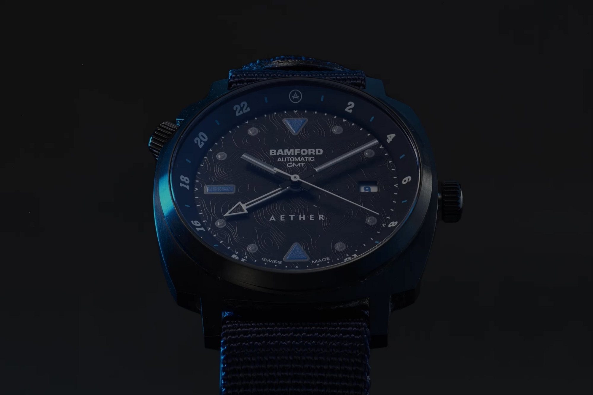 Aether + Bamford watch with black background