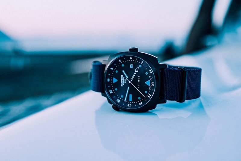 Aeford + Bamford collaboration watch set against blue background