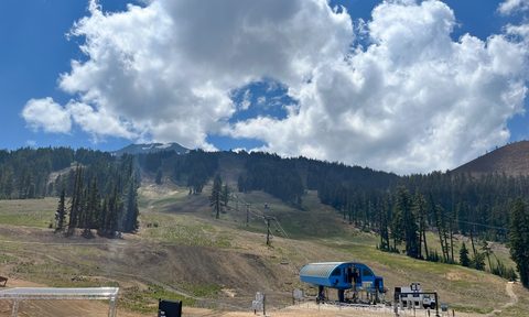 An empty chair lift line on a weekday at Bachelor Bike Park