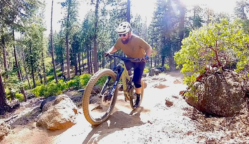 Climbing through a rocky section on the Canyon Spectral CF 8