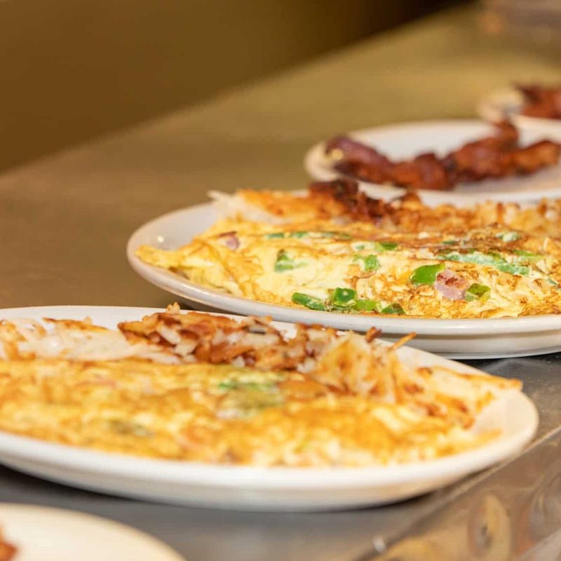 The omelets being plated at Coffee Pot Restaurant in Sedona, Arizona.