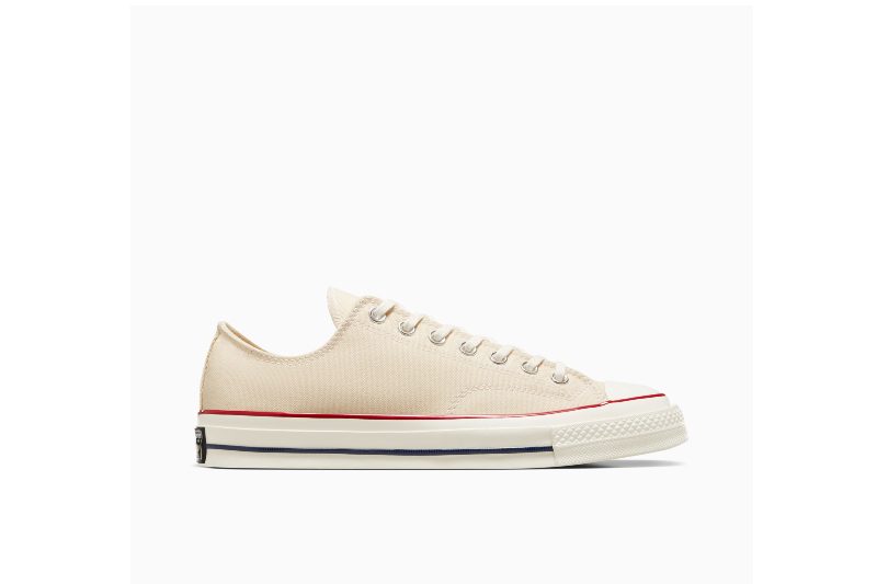 Converse Chuck 70 Vintage Canvas - Low parchment colored against a light gray background.