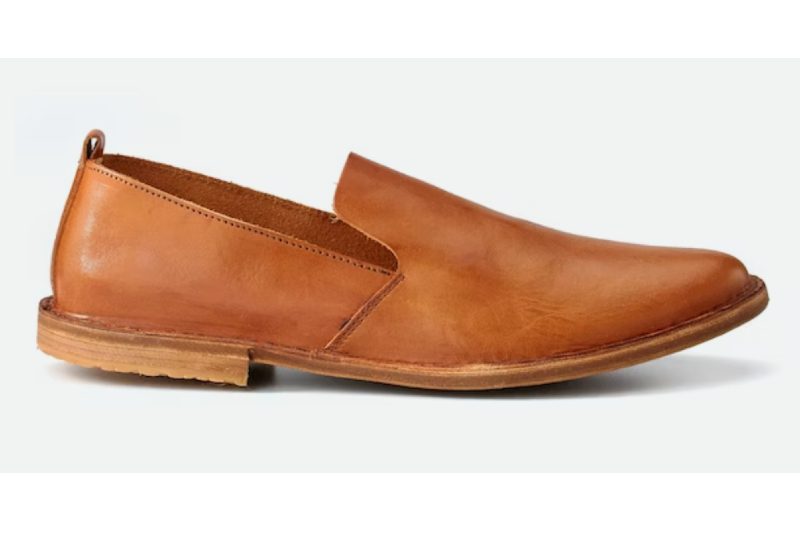 Huckberry Astorflex Patnoflex Travel Loafer tan colored on a light gray background.