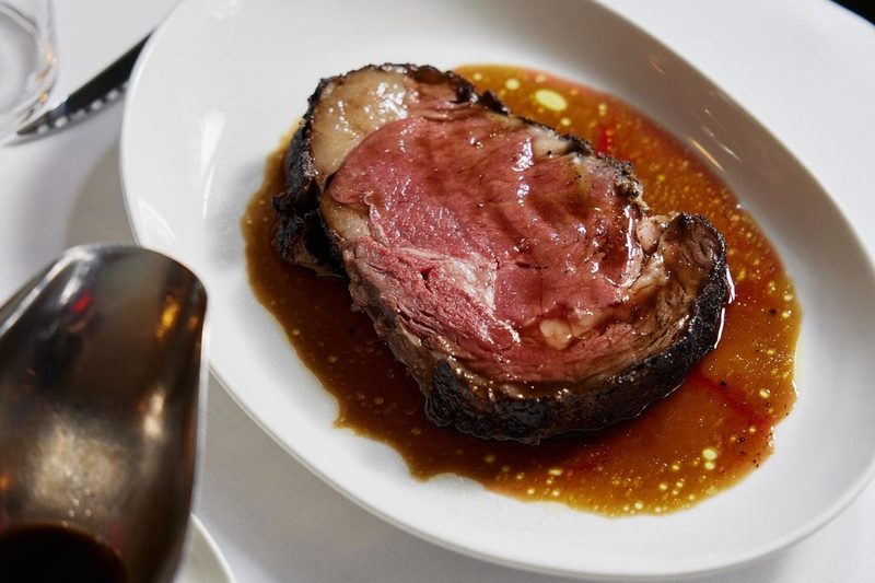 prime rib on white plate.
