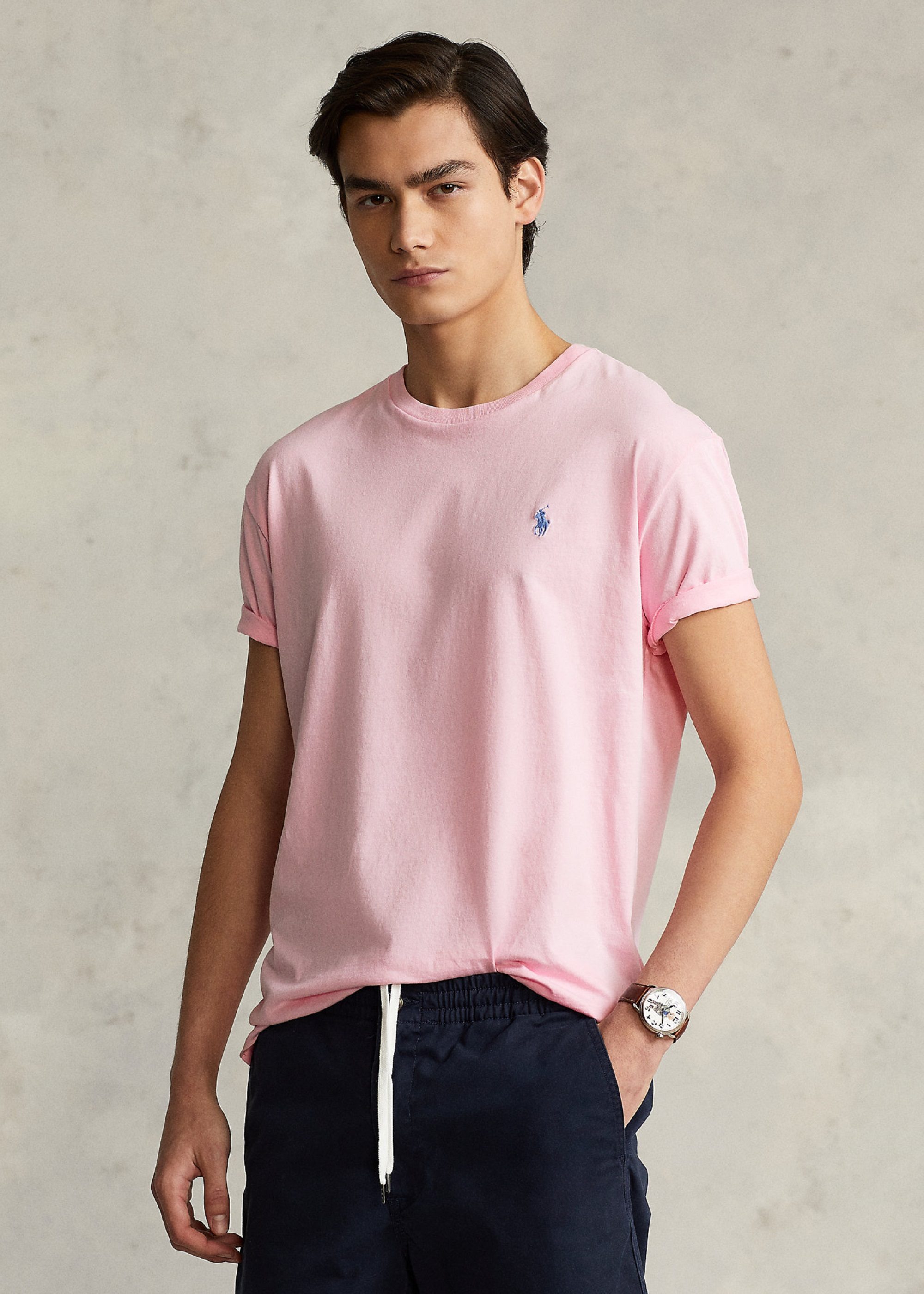 Man in pink Ralph Lauren tshirt and sweatpants