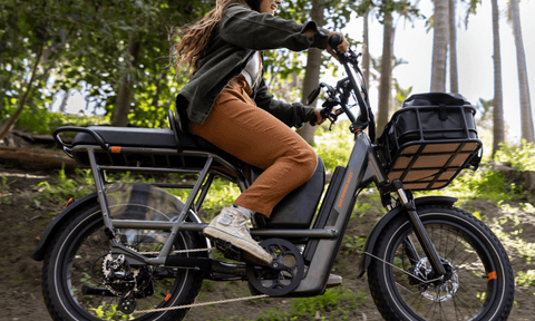 Rad Power Bikes lifestyle image biking on trail