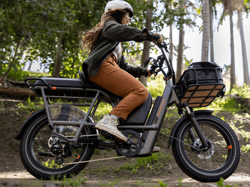Rad Power Bikes lifestyle image biking on trail
