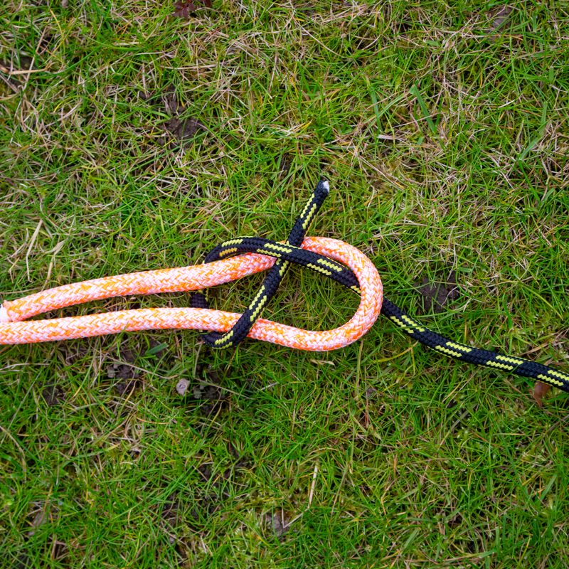 Two ropes tied almost into a sheet bed. They just need to be pulled tight.