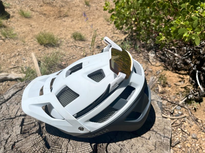 Smith Wildcat sunglasses sitting on a Smith Forefront 2 helmet