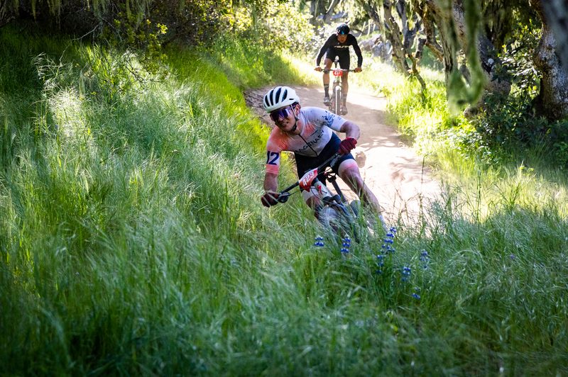 Two XC mountain bikers riding trails on the new F+B 25 XC wheelset at the Sea Otter Classic