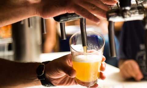 Beer being poured from tap