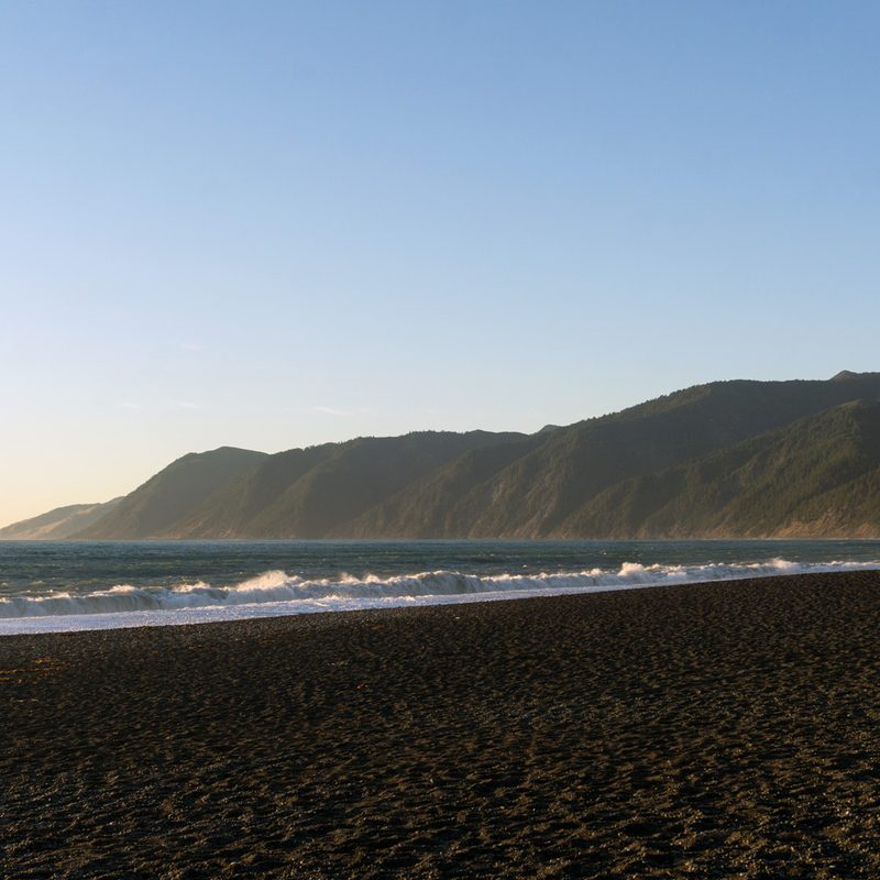 Gentle waves lapping the shore at Black Sands Beach in California's Shelter Cove.