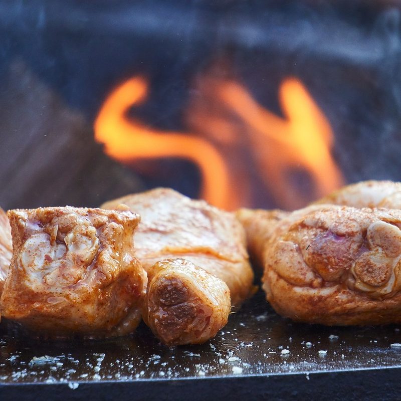 Chicken legs on grill