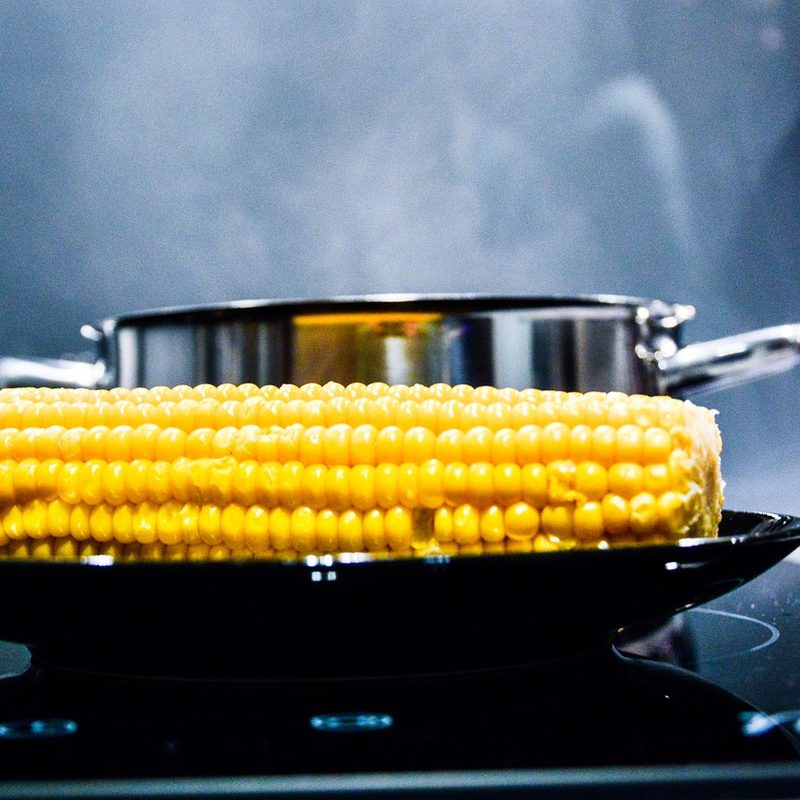 Corn on black plate