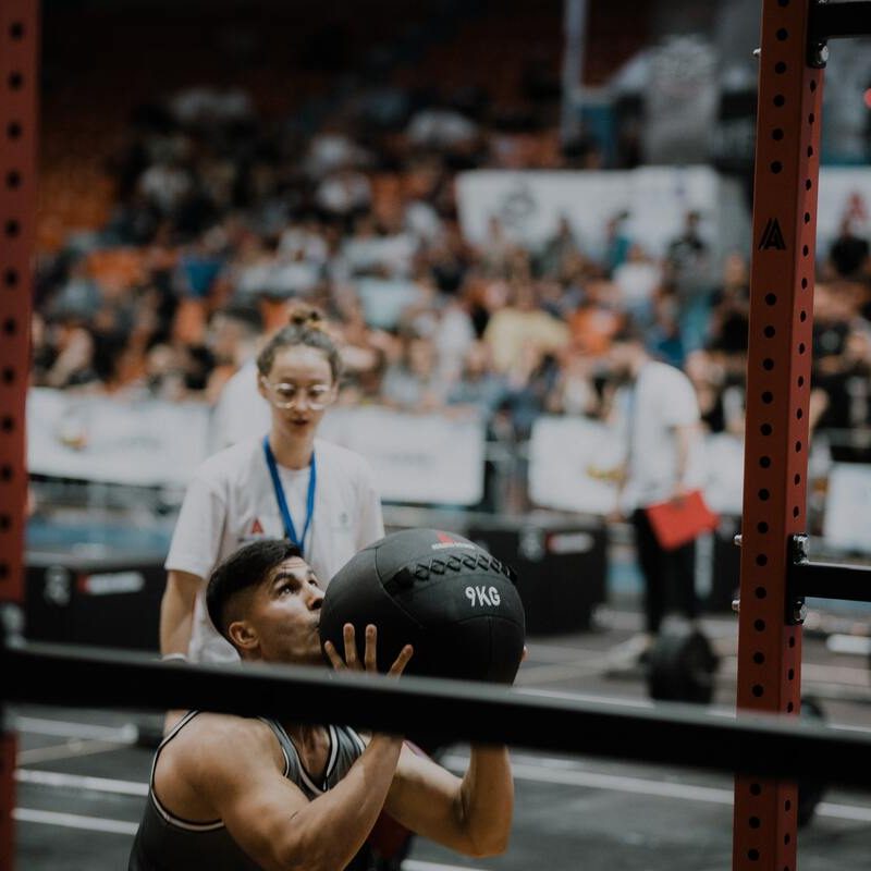 Man using a medicine ball.