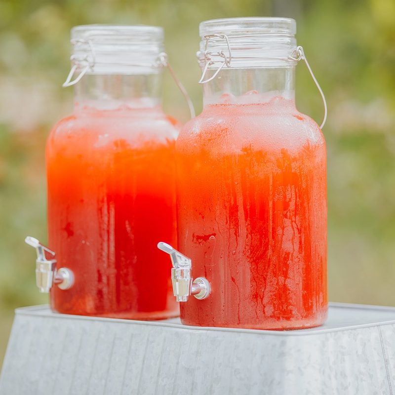 Juice in pitchers.