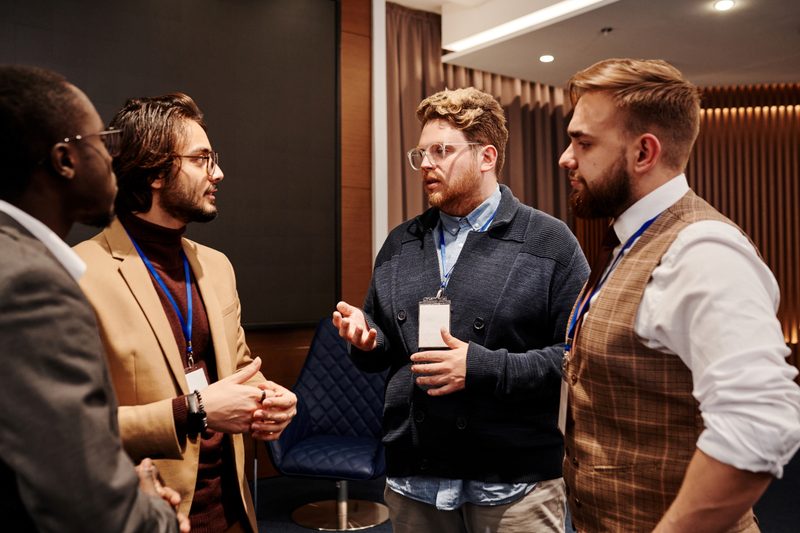 Men standing together and talking