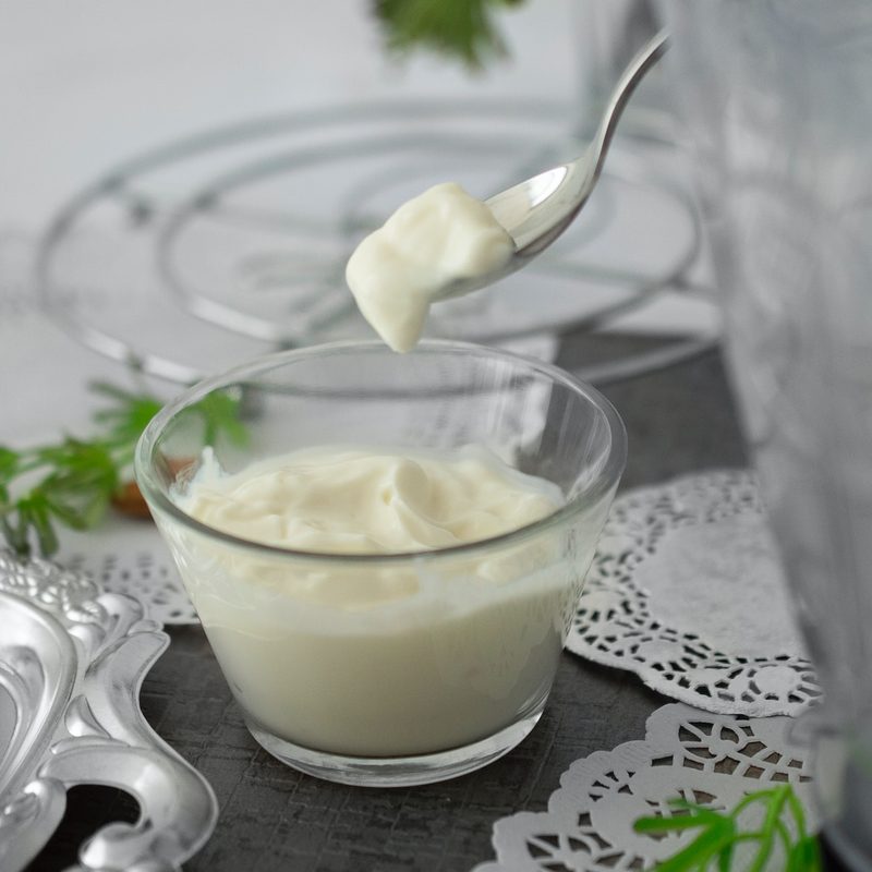 A glass bowl of yogurt