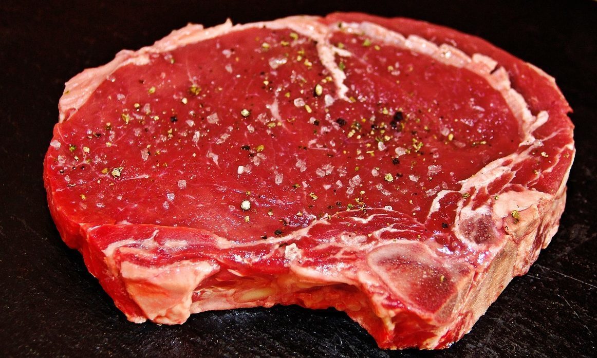 Raw ribeye steak