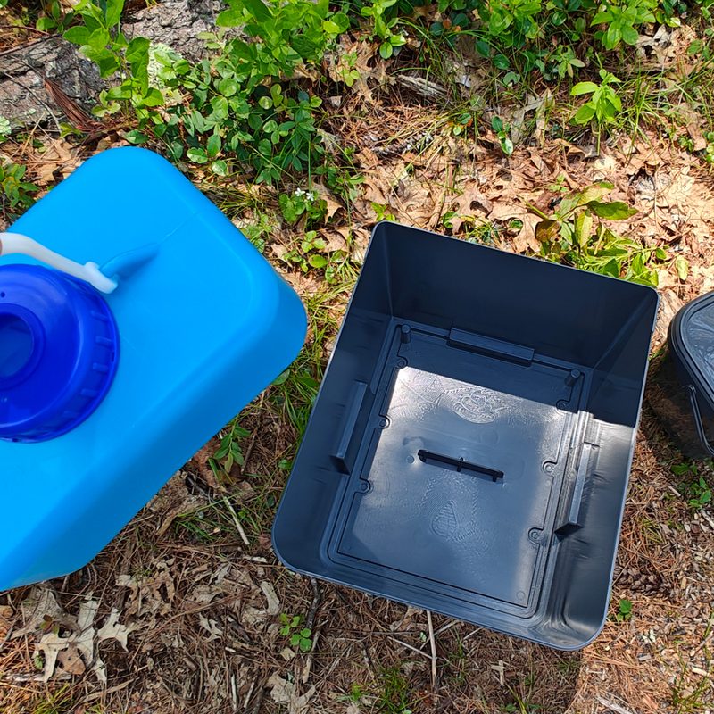Separate waste chambers of the Trelino Evo S portable RV composting toilet.