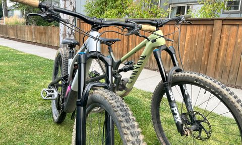A picture of 2 trail bikes that have had some component upgrades