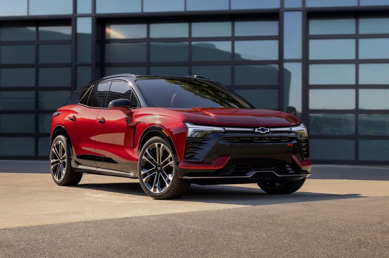 A red 2024 Chevrolet Blazer EV parked outside.