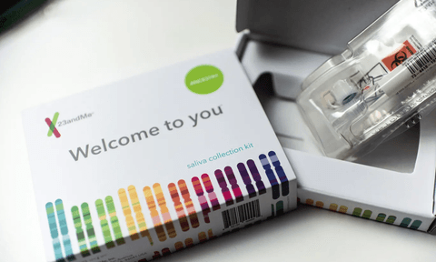 A 23andMe DNA Testing Kit on a table.