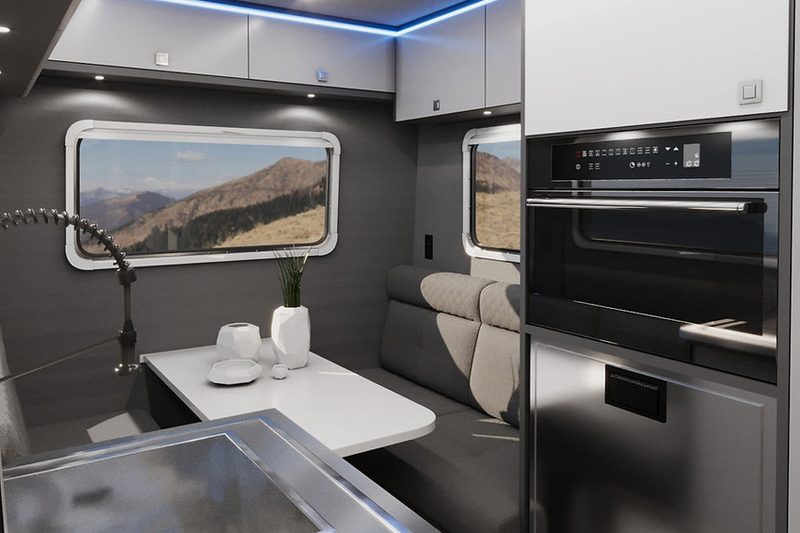 Kitchen and dinette inside the 2023 27North RexRover camper/truck.