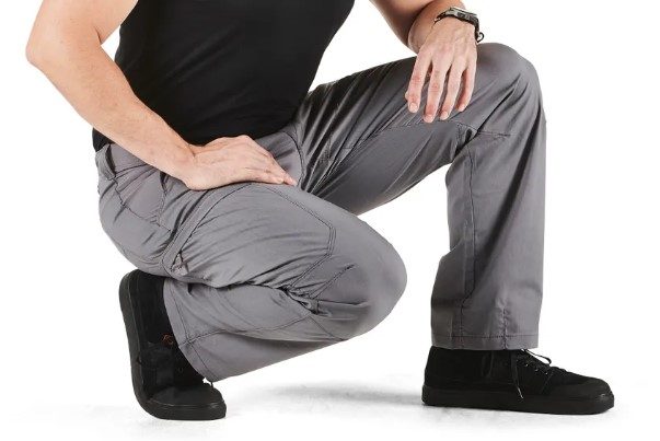 Man kneeling in the 5.11 Apex Pant