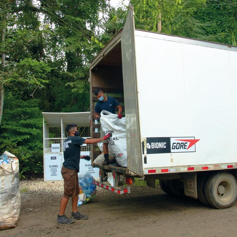 A lorry load of plastic is loaded up on the beach as part of the GORE-TEX/BIONIC collaboration.