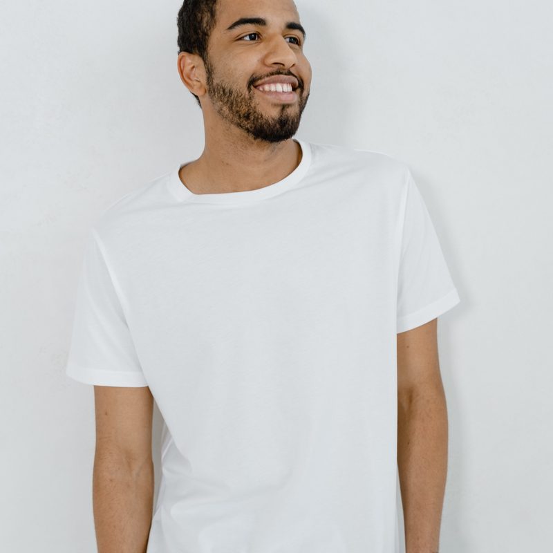 Man in white crew neck tee