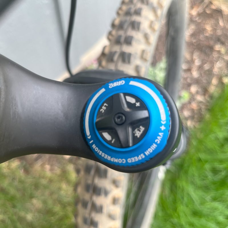 The compression adjustment dial on the top of a Fox 36 fork